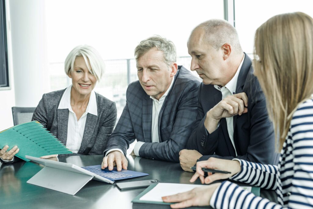 Werbefotografie ITSV- Gruppenfoto bei einer Besprechung